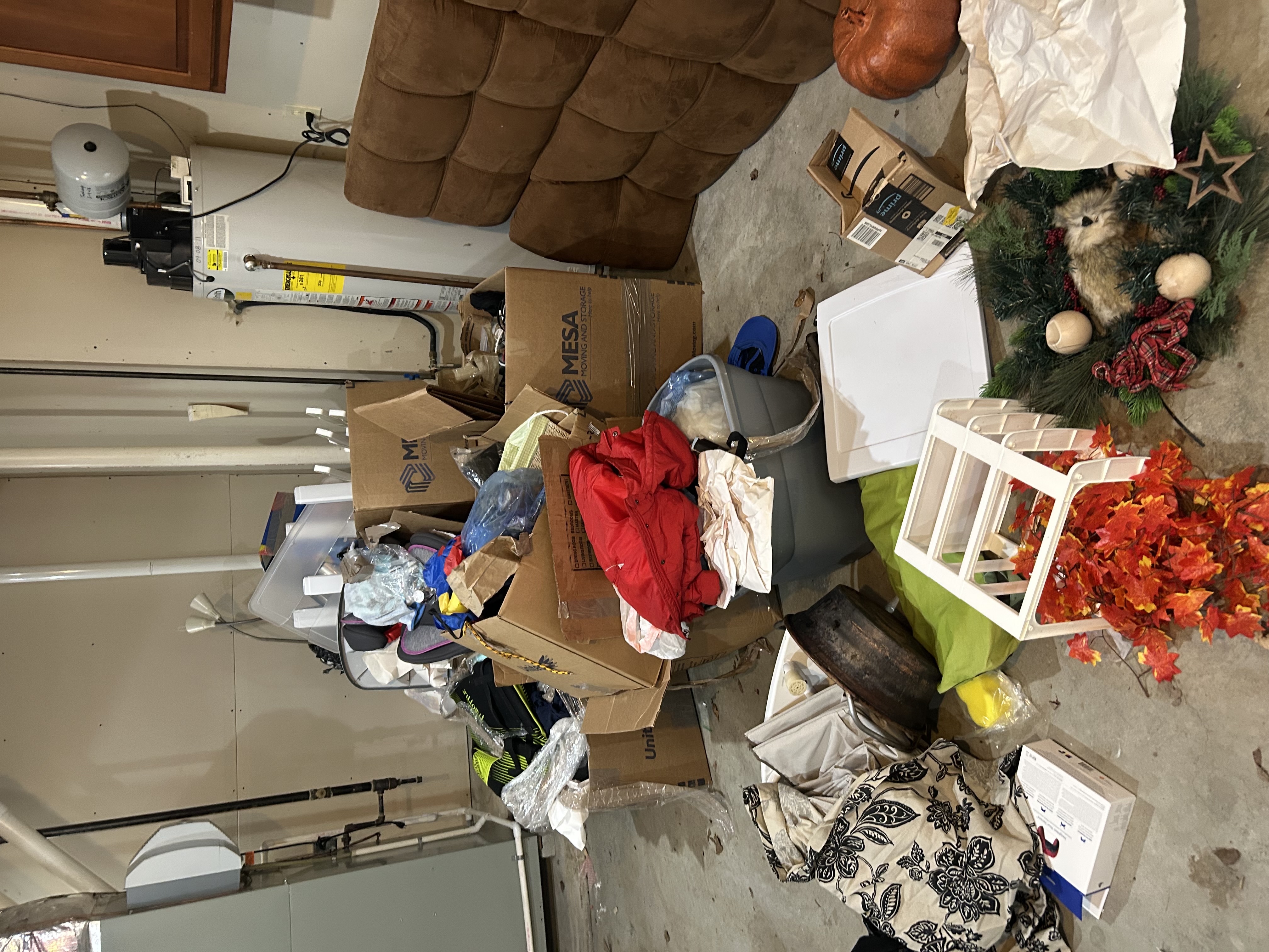 Garage clutter and junk pile before removal