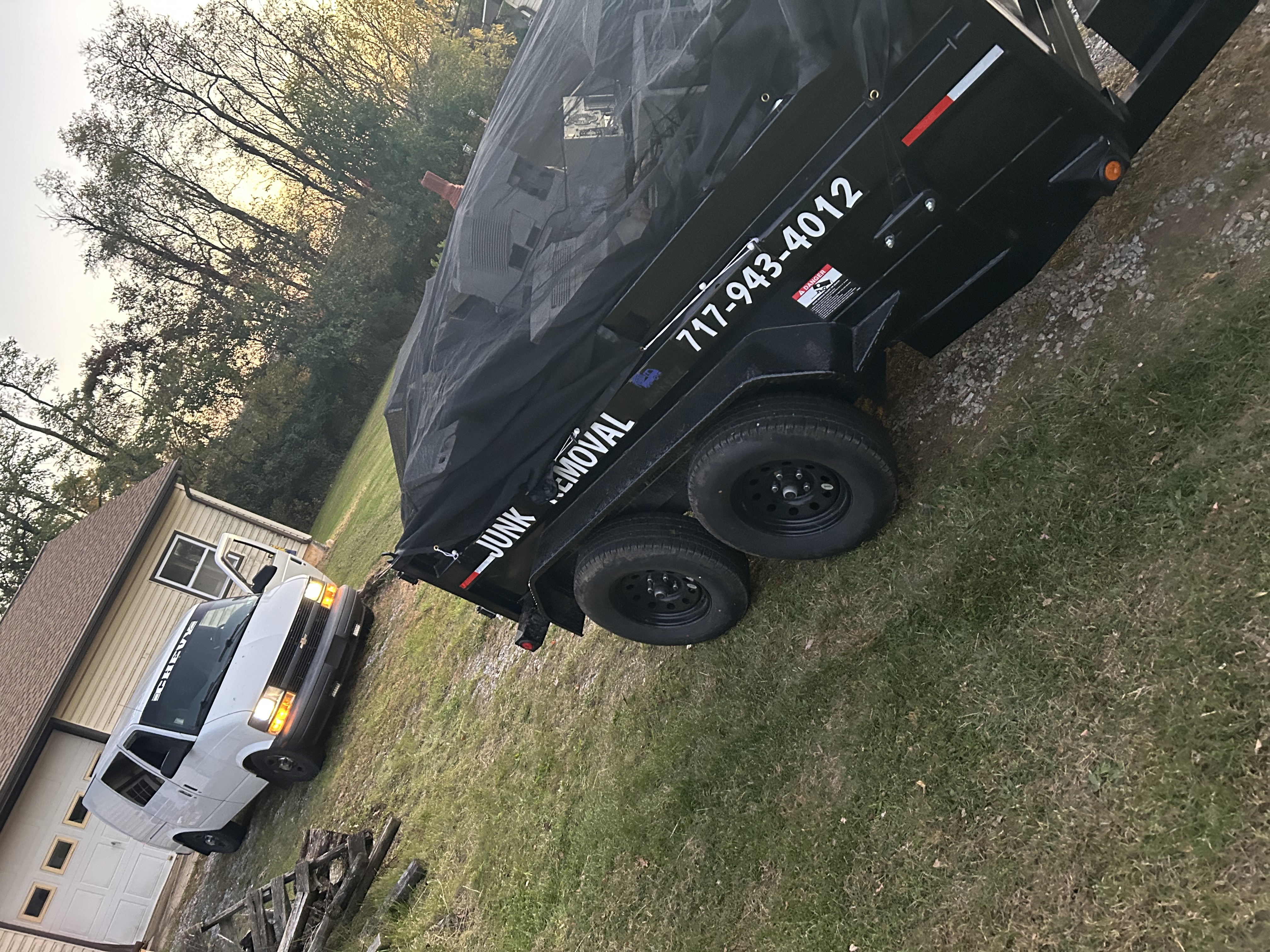 Junk Squad trailer loaded with removed items at a local property in Central PA